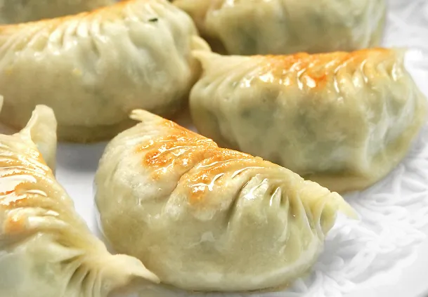 韭菜猪肉蒸饺的做法步骤 韭菜猪肉蒸饺的做法步骤